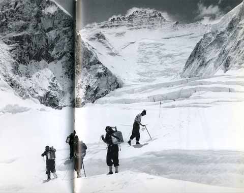 
The sheen on the ice of the Lhotse Face glistens in the hot sun as Wilfrid Noyce and the Sherpas move towards Camp IV. The Lhotse Face was probably the biggest challenge for the expedition, taking 12 days before Wilfrid Noyce reached the South Col on May 21, 1953. - Alfred Gregorys Everest book
